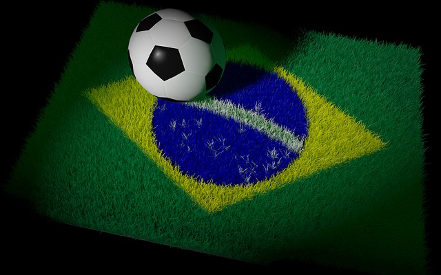 ブラジルの国旗とサッカーボールが置いてある画像